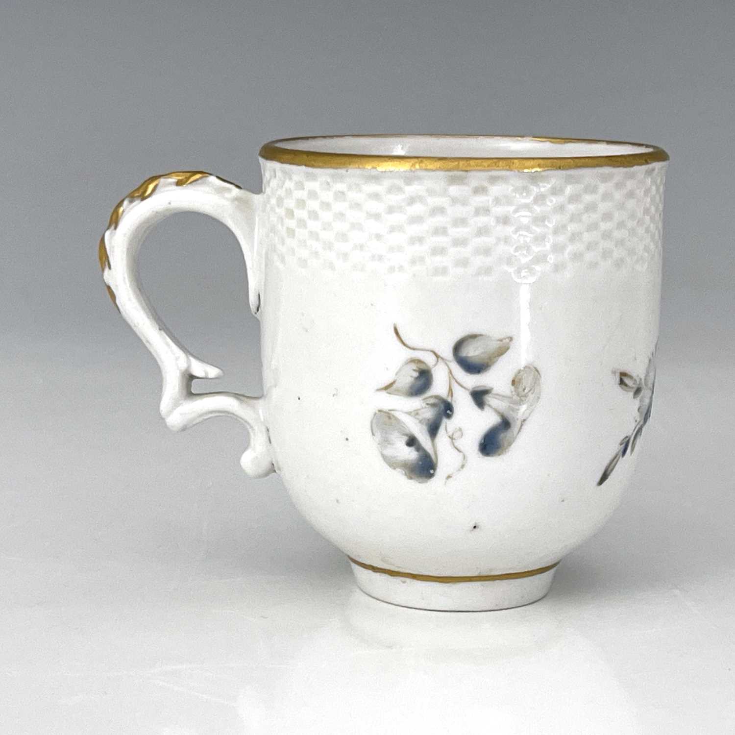 A Bristol porcelain coffee cup, cross mark, circa 1770, rattan moulded border above blue - Image 4 of 6