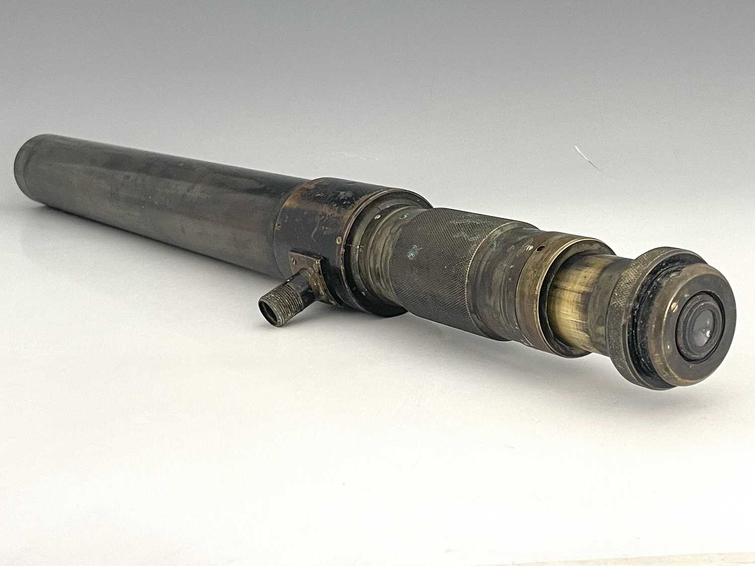 A WWI Ross of London sighting telescope, blackened brass barrel with 'Change of Power' adjustment,