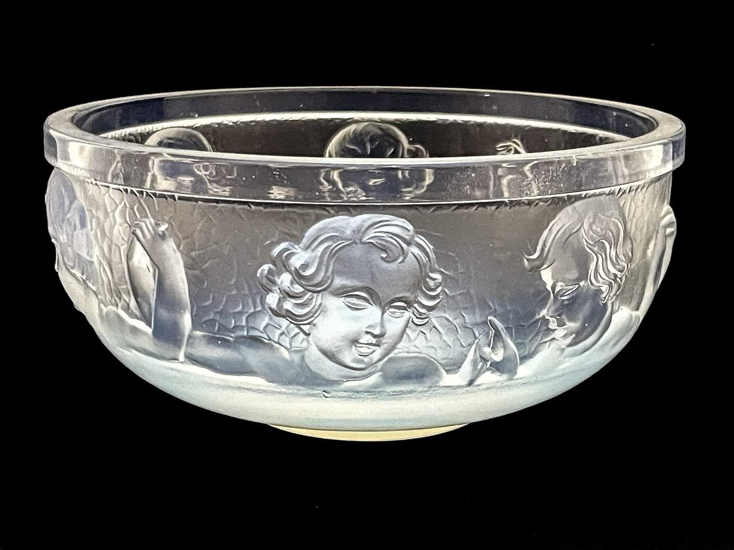 Sabino, an opalescent glass bowl, modelled in relief with a band of children holding hands,