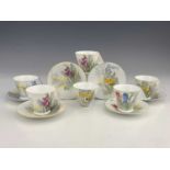 Shelley, an Art Deco Mode shape tea set of six harlequin cups and saucers, Spring Flowers design
