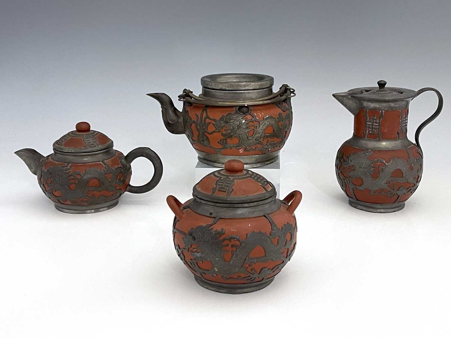 A Chinese Yixing four piece tea set, pewter overlaid redware, chased dragon design below Chinese - Image 4 of 8
