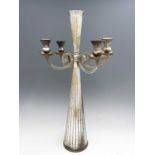 A large Jugendstil silver plated four arm candelabrum, circa 1925, conical form with embossed reeded