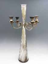 A large Jugendstil silver plated four arm candelabrum, circa 1925, conical form with embossed reeded