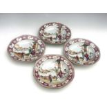 A set of four Chinese famille rose soup plates, 18th century, octagonal form, painted in the