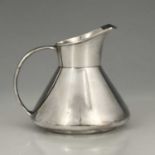 An Arts and Crafts silver jug, Henry Hobson and Son, Birmingham 1909, bulbous conical form with