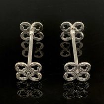 A pair of Gothic Revival silver plated knife rests, circa 1860, in the style of A W N Pugin, each