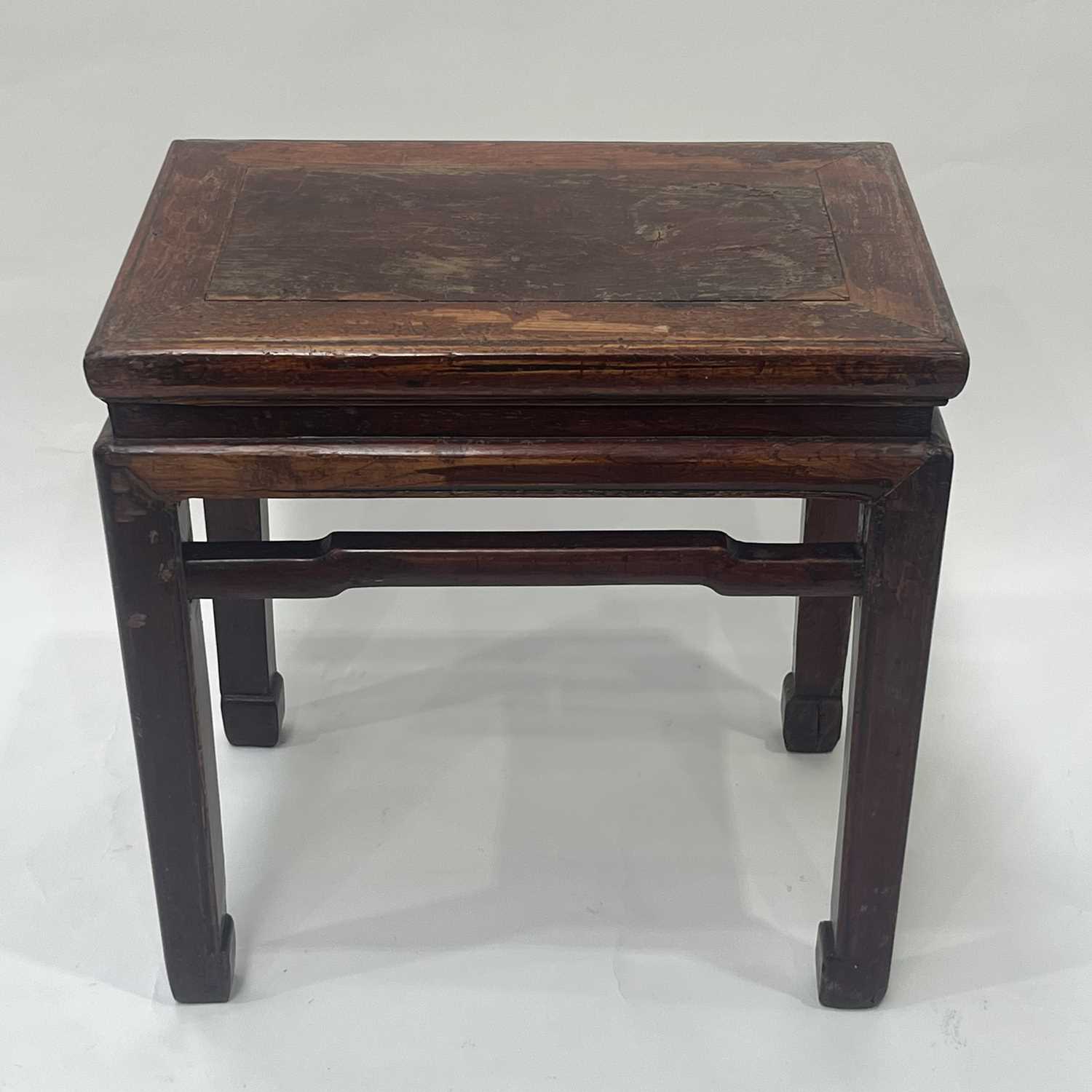 A Chinese stained and lacquered wood low table or stool, probably 19th century or earlier, - Image 2 of 3