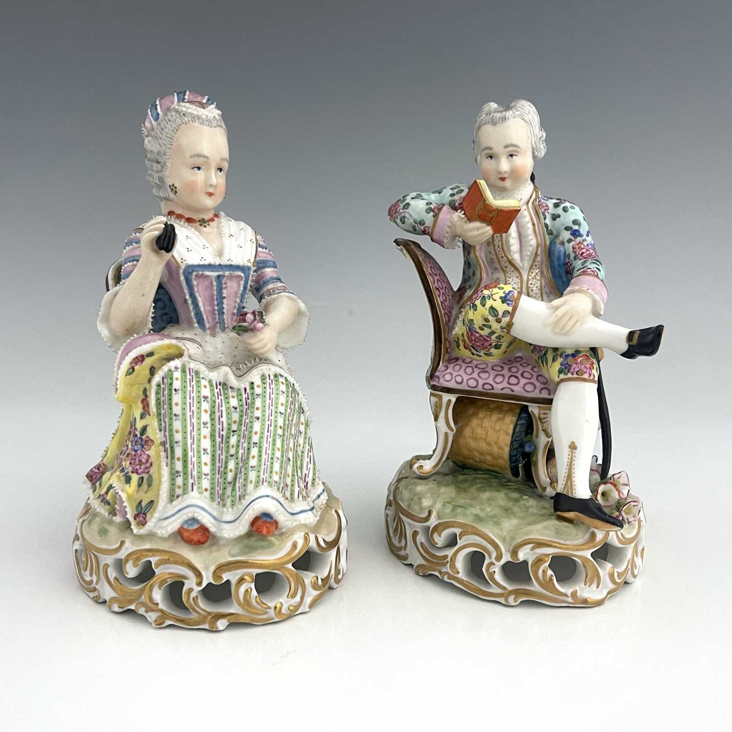 A pair of Meissen type figures, probably late 18th century, model 137, modelled as a seated woman - Image 2 of 6