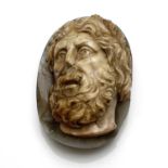 A carved agate cameo of Marcus Aurelius, in the Roman style, possibly of the period or later,