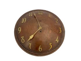 An Art Deco oak wall clock, Northern Goldsmiths Company, Newcastle Upon Tyne, convex circular form