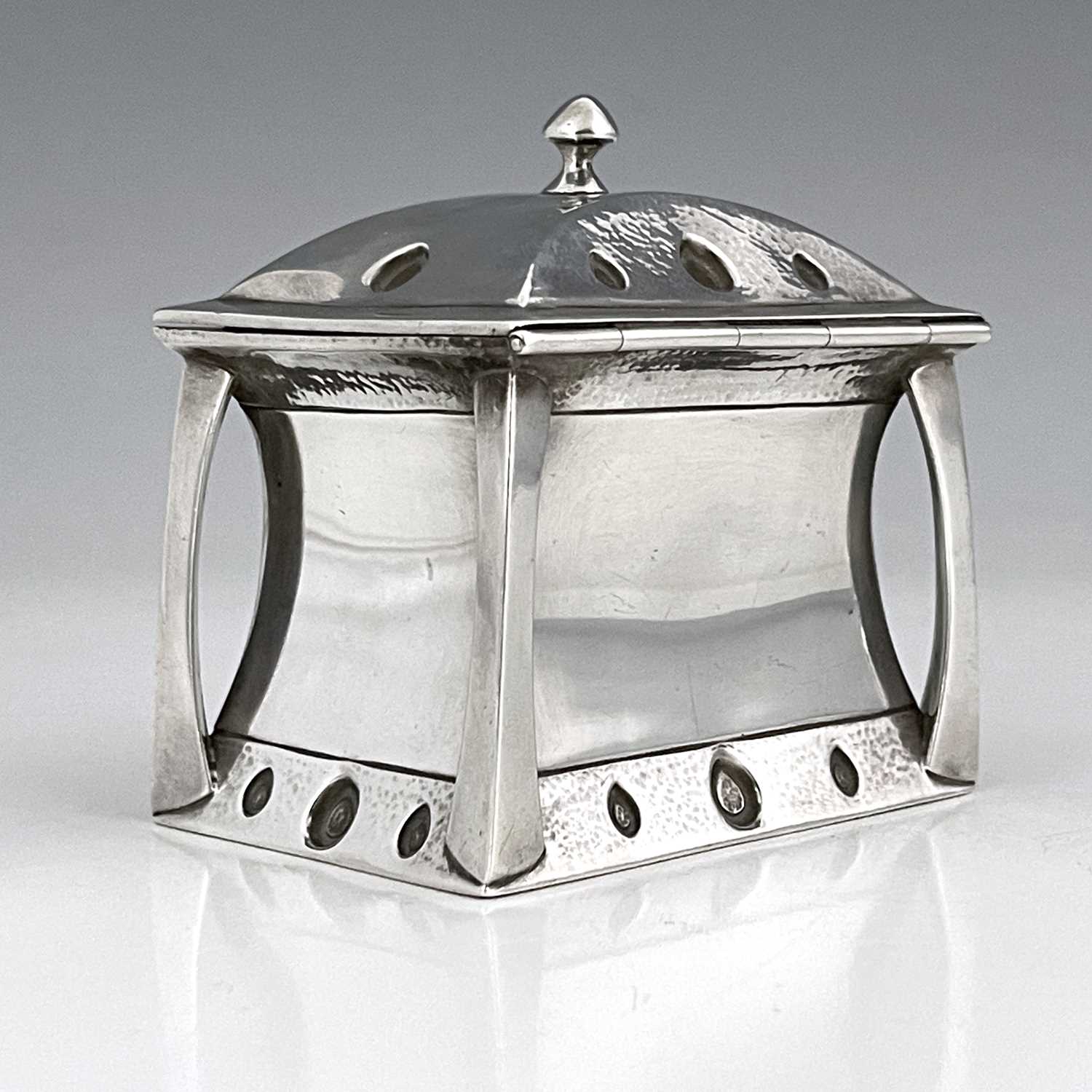 William Hutton and Sons, an Arts and Crafts silver tea caddy, London 1903, waisted cuboid form