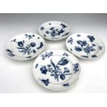 Four Meissen blue and white plates, piecrust ogee rims, painted with central floral bouquets of