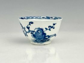 An early Worcester blue and white tea bowl, workmans mark, circa 1755, finely potted and painted