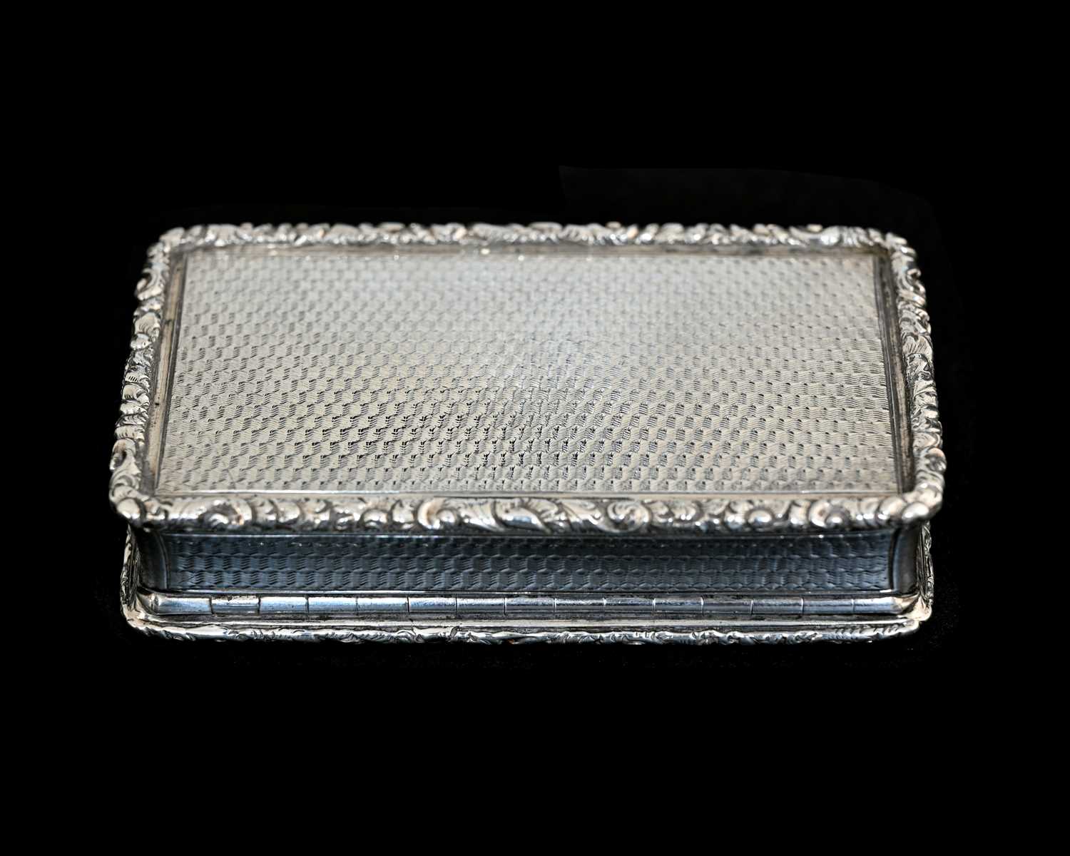 A Victorian silver snuff box, of rectangular form, with cast foliate scroll border, the body - Image 4 of 6