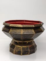 An early 20th century Thai lacquered and gilded metal 12-sided betel nut stand, D.24cm