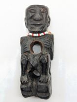 An 18th-19th century Philipino tribal carved gong holder element, Kankanay People, Northern Luzon,