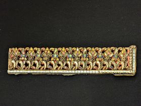 A 19th century Burmese or Thai pierced gilded wooden element inset with coloured mirrored glass,
