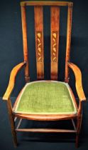 In the manner of Charles Rennie Mackintosh, an Arts and Crafts inlaid mahogany armchair