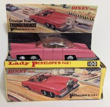 Dinky Toys, No. 100 Lady Penelope s Fab 1 comprising of dark pink body with gold interior, driver,