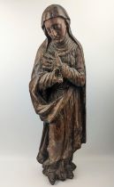 A late 16th century Spanish wooden carving of the mourning Virgin. H.63cm. Provenance: Acquired by