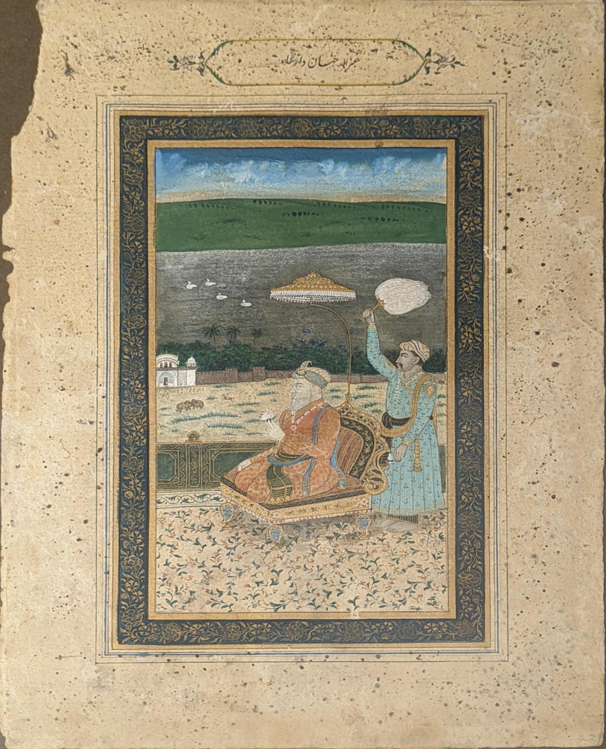 A fine 19th century Indian miniature painting of a seated nobleman, H.19cm W.10cm