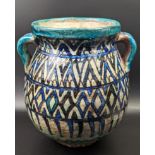 A fine 17th century Ottoman Syrian Damascus glazed pottery twin handled vase, H.22.5cm