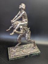 Deco sculpture of a nude riding a faun, mounted on marble base, indistinctly signed, H.27cm
