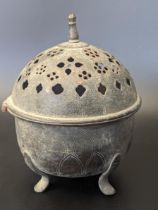 An early Islamic possibly Seljuk bronze incense burner, H.13cm