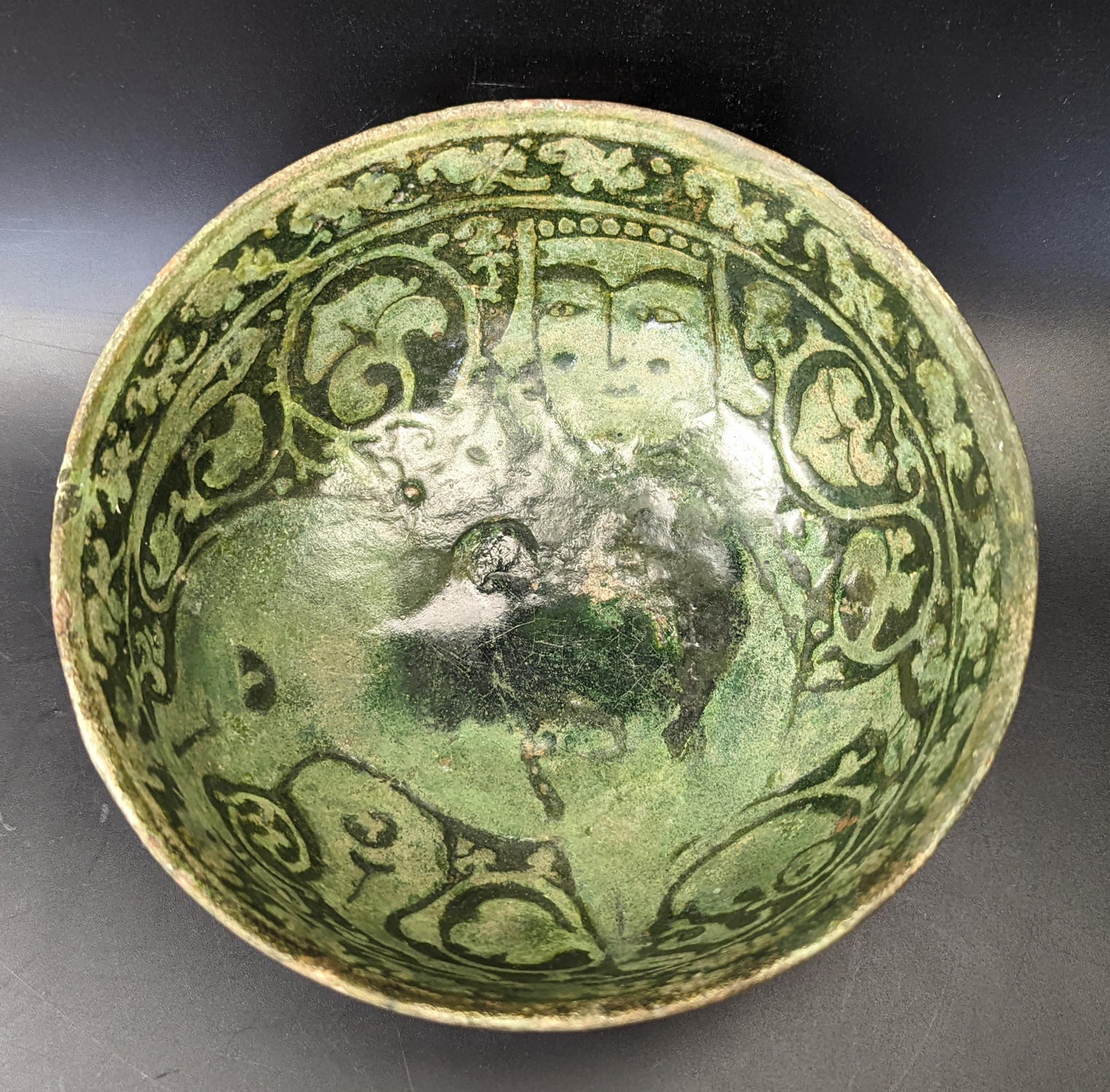 A rare 12th century Persian Garus ware green glazed pottery bowl depicting a mythical creature, H. - Image 2 of 5