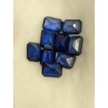 9 loose blue gemstones