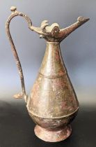 A 12th or 13th century Seljuk Persian Khurasan bronze Ewer with bulls head top, H.21cm