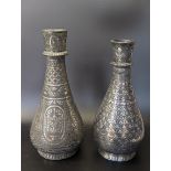 Two early 19th century Indian Bidri silver inlaid huqqa bases, H.24cm and 22.5cm