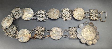 A 19th century white metal coin belt