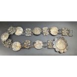 A 19th century white metal coin belt
