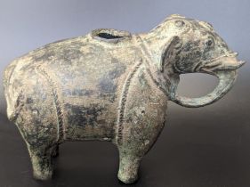 A rare 17th century or earlier South Indian or South East Asian bronze elephant shaped vessel, H.