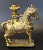 An 18th century South Indian brass horse, possibly an oil lamp base, H.13cm