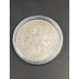 A Chinese 1908 British trade one dollar coin