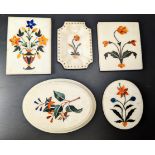 A collection of five 19th / early 20th century Indian Agra pietra dura inlaid marble paper weights