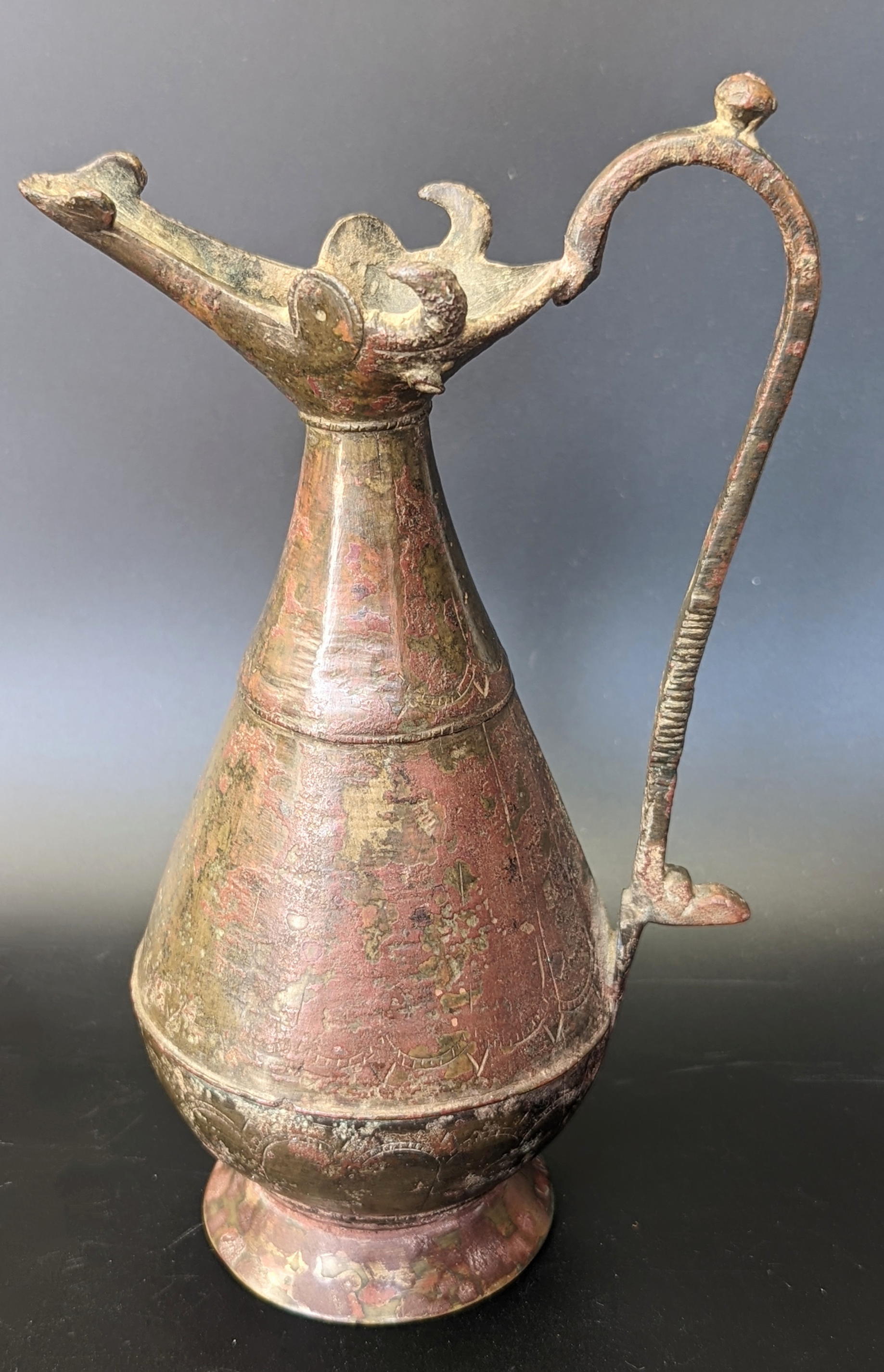 A 12th or 13th century Seljuk Persian Khurasan bronze Ewer with bulls head top, H.21cm - Image 2 of 2