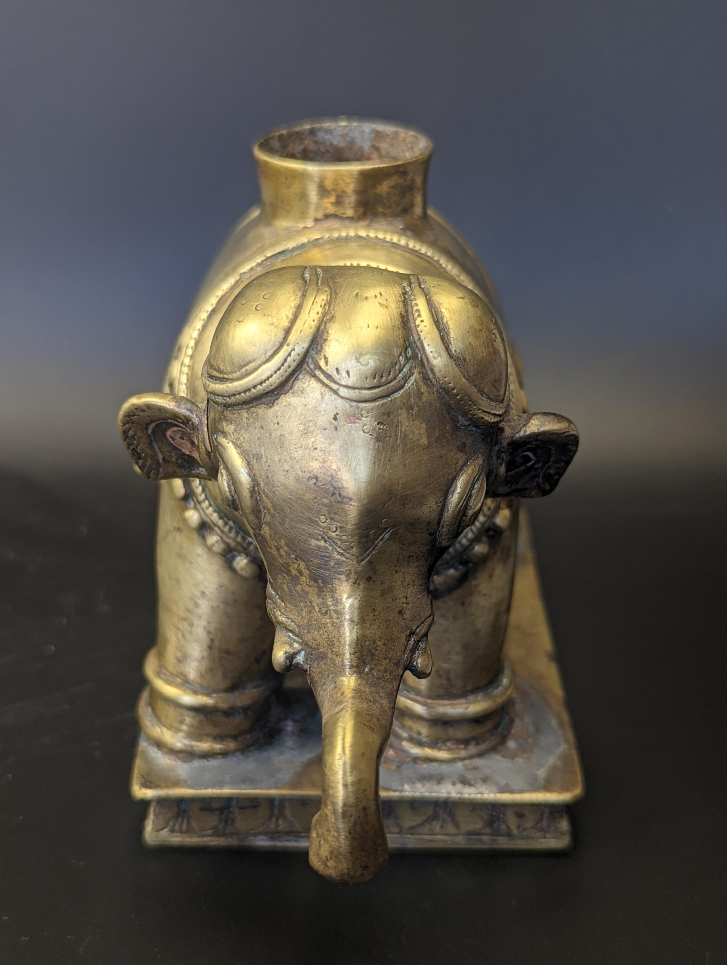 A 17-18th century Indian Deccani brass elephant, H.12cm L.18cm - Image 4 of 4