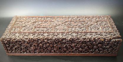 A finely engraved 19th century Indian Mysore sandalwood box, carved with flora and fauna, hinged
