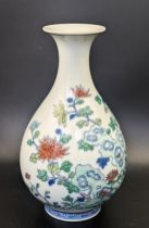 A Chinese Yu Hu Chun Ping vase, Yongzheng mark to base, possibly later, depicting doucai decoration