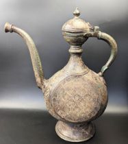 A fine North Indian engraved brass Ewer, H.31cm