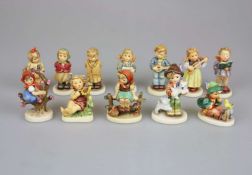 12 Hummel Figuren