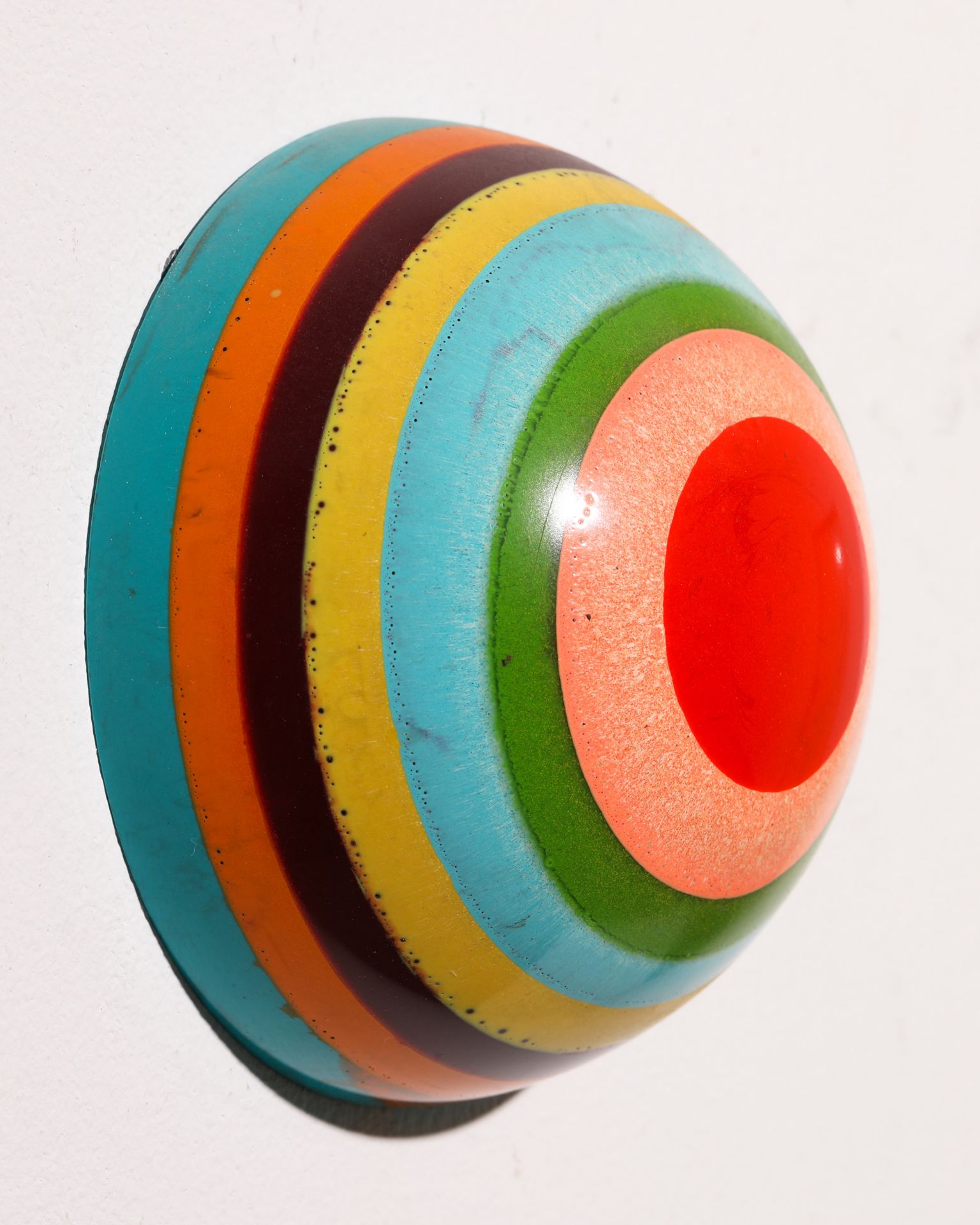 Markus Linnenbrink*, Pupille B3, 2002, solid hemisphere, colored epoxy resin