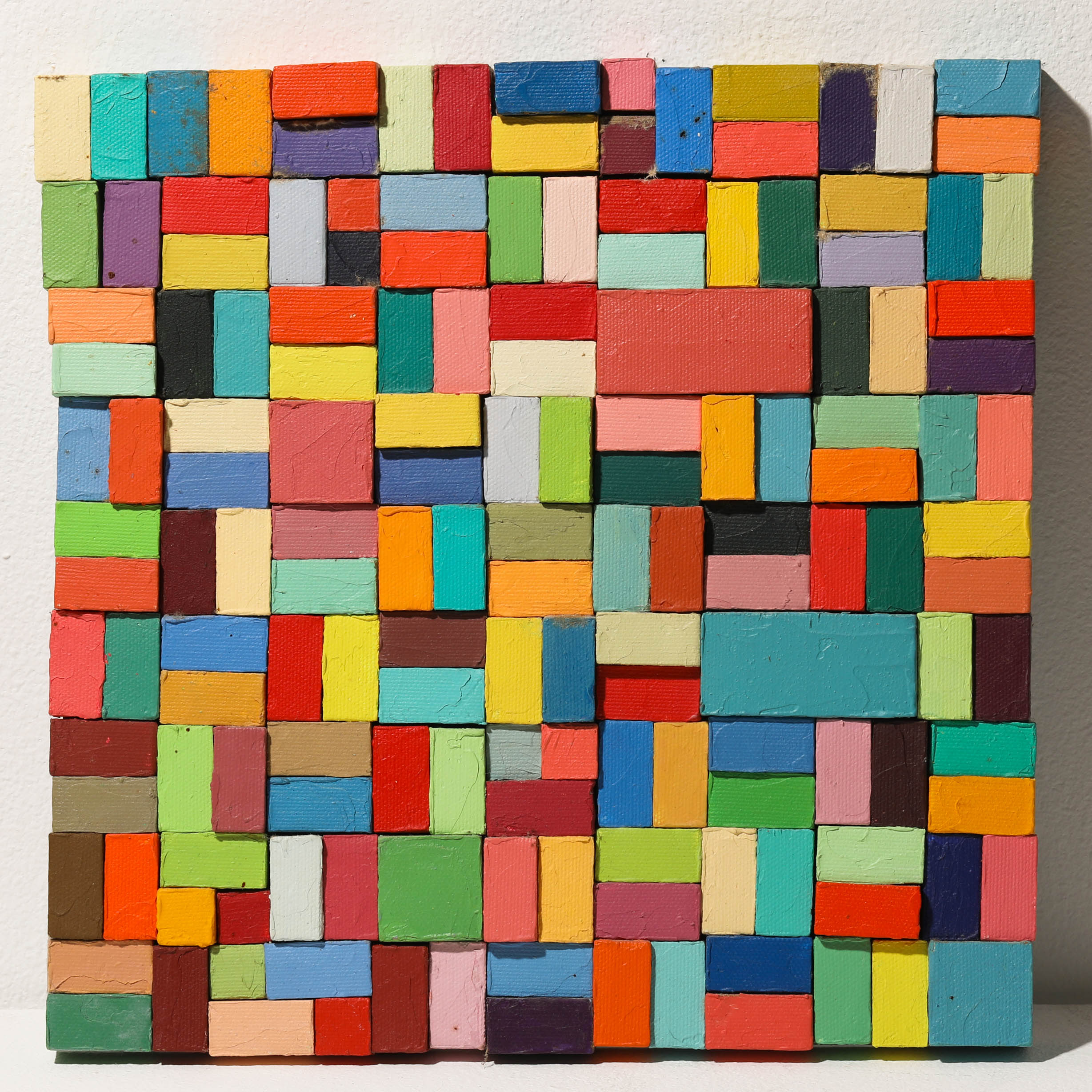 Carlos Estrada-Vega, 2001, small cube wall object