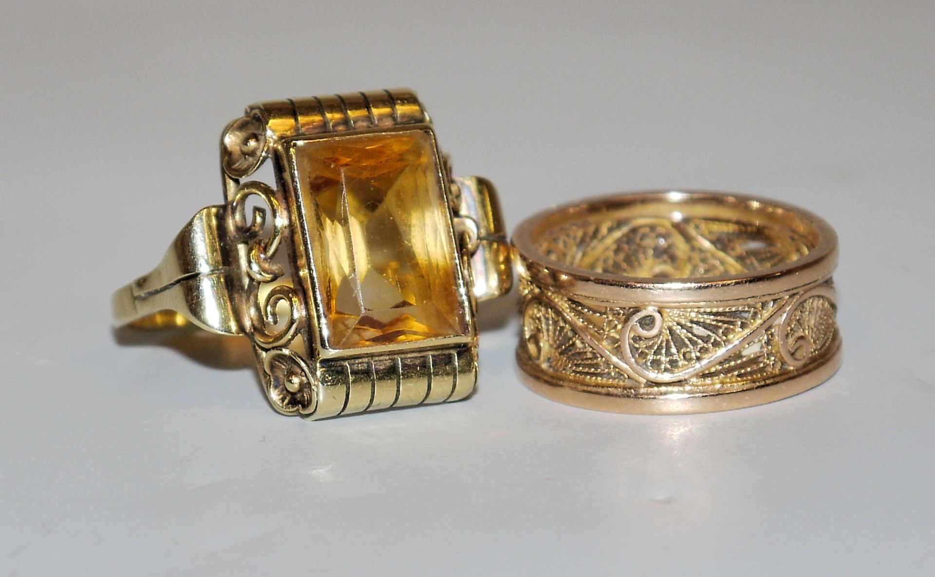 Citrine ring and filigree ring, gold, circa 1920-1940