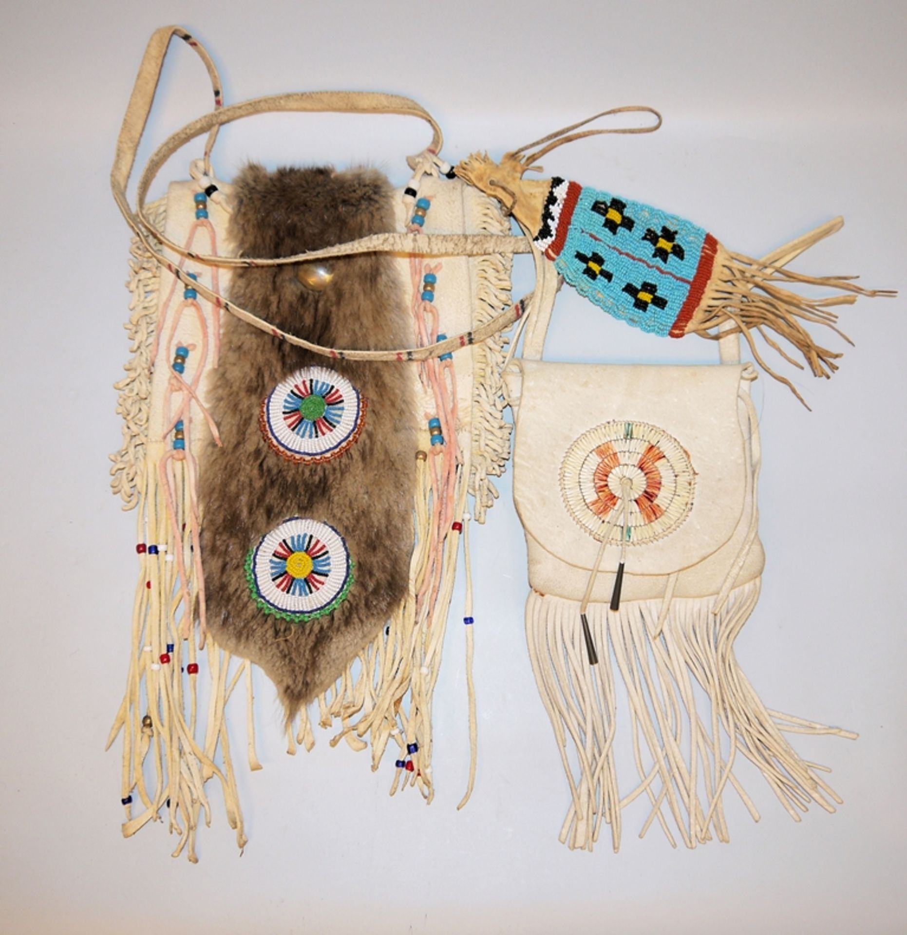 Three medicine bags in the style of the Native American Indians