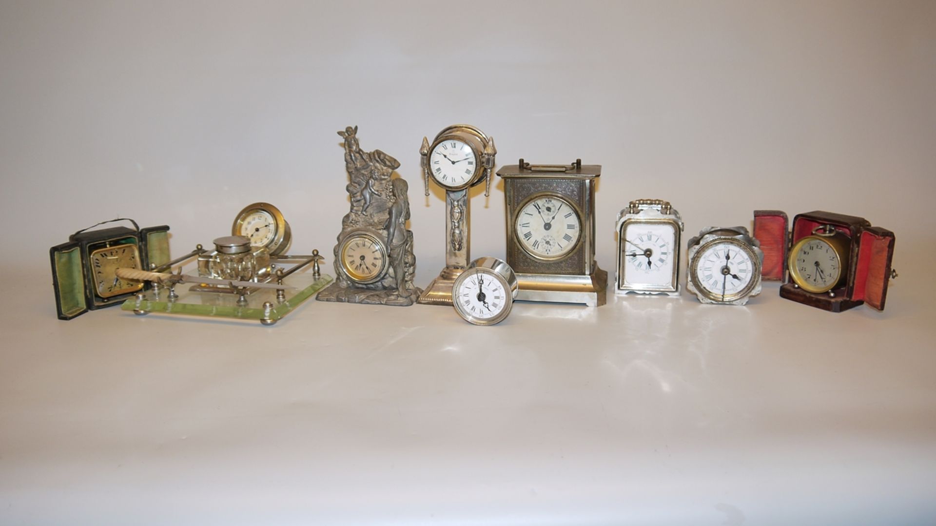 Nine table clocks and alarm clocks, circa 1900/20