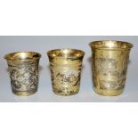 Three Russian silver cups with guilloché decoration, Moscow 1870-73